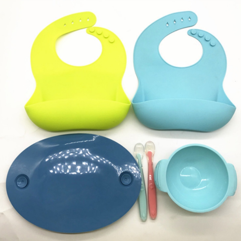 Pláta aoibhinn ubhchruthach comhtháite silicone Pláta aghaidh aoibhinn leanaí Silicone Baby Bib