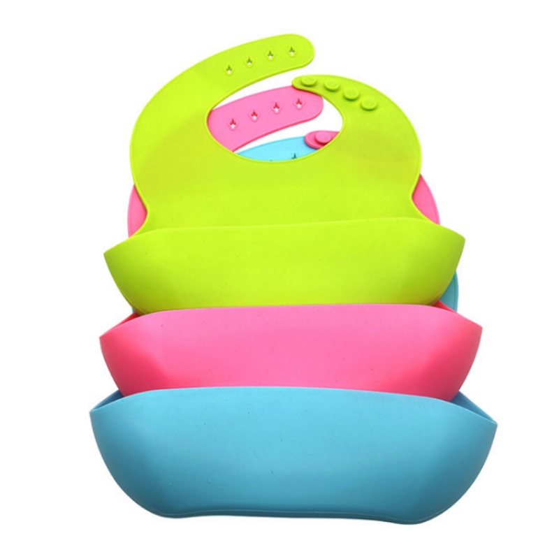 Pláta aoibhinn ubhchruthach comhtháite silicone Pláta aghaidh aoibhinn leanaí Silicone Baby Bib