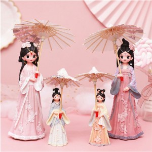 Cailín dainty le scáth fearthainne