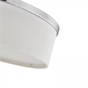 Lampa Uasteorainn Óstán Staybridge Suites le bailchríochnicile brushed ag an seomra aíochta agus an chonair